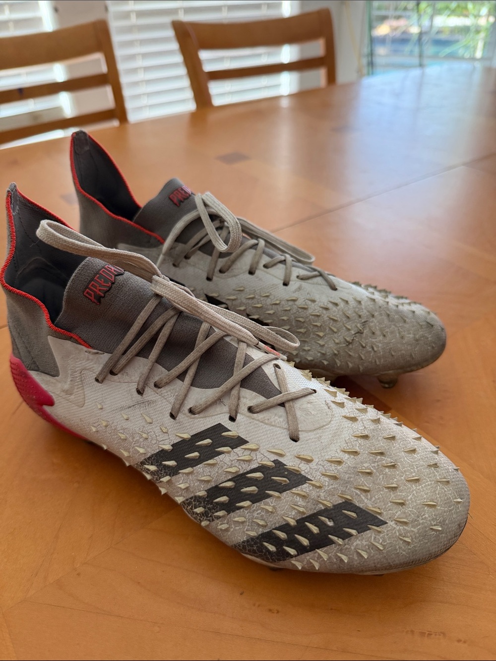 adidas Predator Men’s Soccer Cleats in Gray with Red Accents